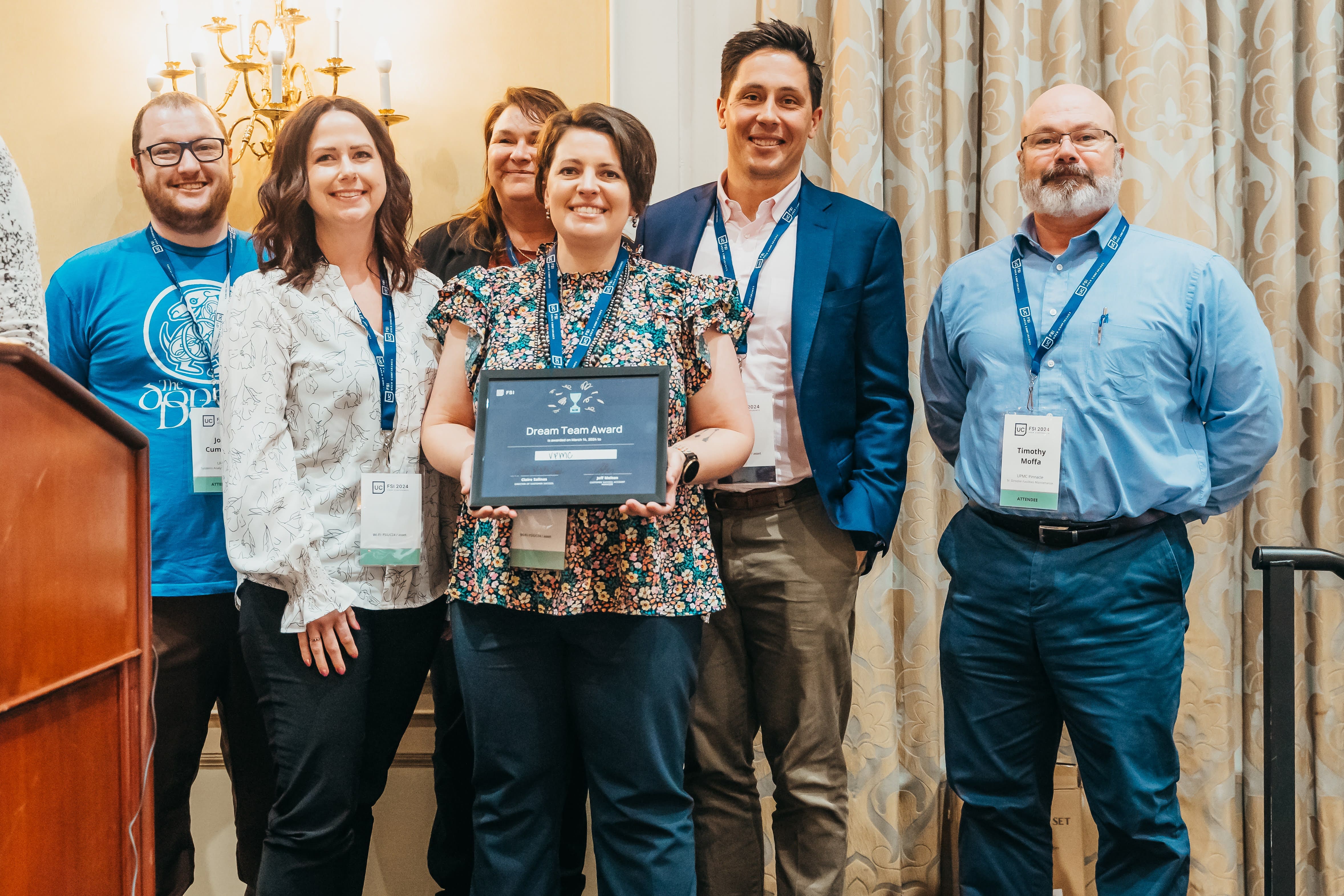UPMC representatives accepting the Dream Team Award at FSI User Conference 2024