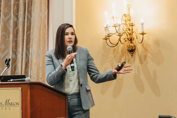 Lindsey Brackett delivering the keynote presentation at FSI User Conference 2024